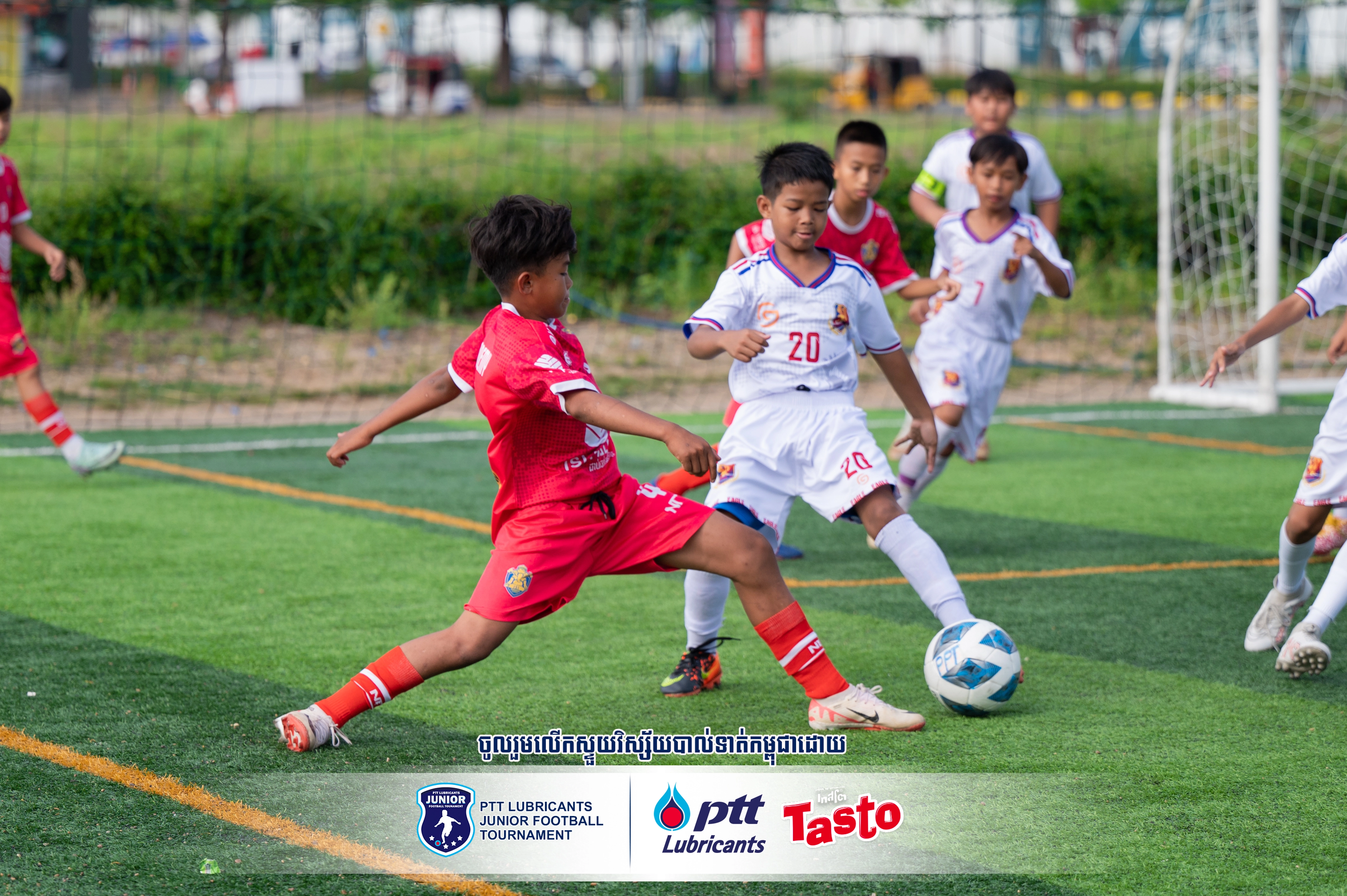 Football players in action at the tournament